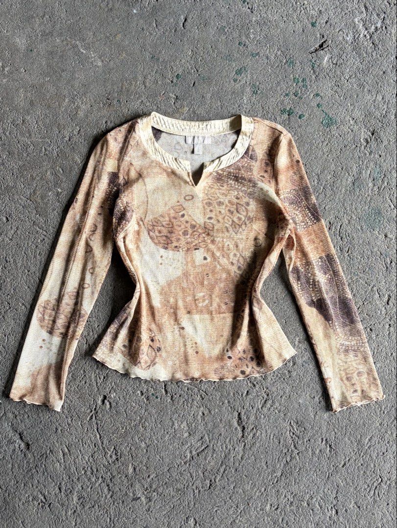 Mesh long sleeve top with brown pattern Y2K (Category: Longsleeves) located in Quezon City. Submitted by ward.drobe (Listing ID 1466194038, Image 1). Description: Size S-M.