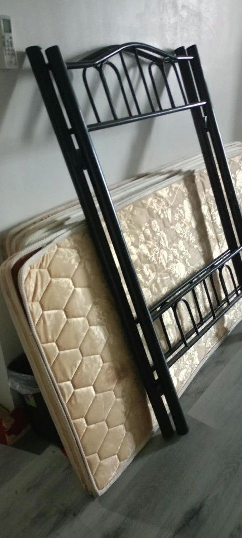 Metal Bed Frames and Mattresses (Category: Bed Frames & Mattresses) located in Manila. Submitted by fastwater.105278 (Listing ID 1466322585, Image 2). Description: - 3 sets Durable black metal double deck - Includes thin mattresses with quilted floral patterns - Ideal for guest rooms, dorms, and rental properties - Available as a bundle or per set - Meet-up or delivery options available — PM to inquire!.