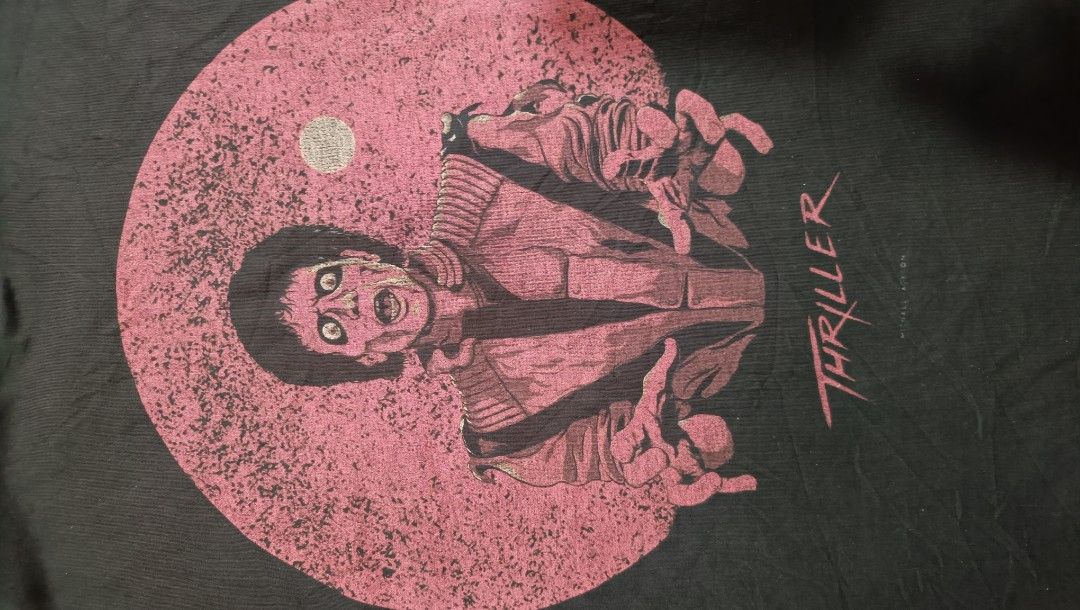 MICHAEL JACKSON THRILLER GRAPHIC TEE (Category: Tshirts & Polo Shirts ) located in Midsayap. Submitted by macoy.picker (Listing ID 1466195420, Image 3). Description: MICHAEL JACKSON THRILLER GRAPHIC TEE SIZE 2 XL DIMES: 23X30 ❌issue: stain (See last pic).