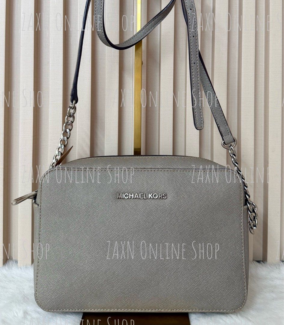 Michael Kors Grey Crossbody Bag with Chain Strap (Category: Cross-body Bags) located in Santa Cruz. Submitted by za2011za (Listing ID 1466289037, Image 1). Description: 100% Authentic/Original Buy with confidence 👌👌👌 LEGIT seller since 2011, sold over thousand items (Please see all sold items) Actual photos displayed Shipping thru LBC J&T Grab or Lalamove MOP: BDO BPI GCash STRICTLY IMPLEMENTED - NO CANCELLATION - NO RETURN - NO CHANGE ITEM - 