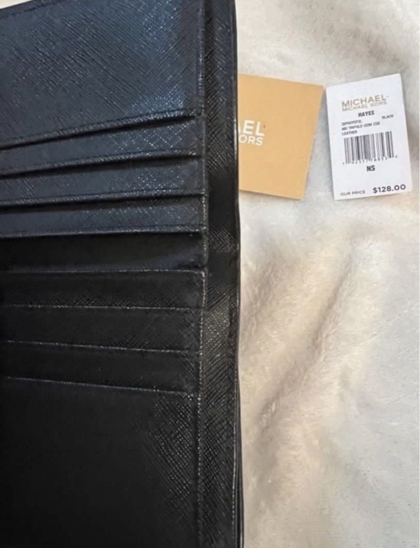 Michael Kors Hayes Trifold Wallet Black (Category: Luxury Bags & Wallets) located in Quezon City. Submitted by claireityyy (Listing ID 1466281138, Image 3). Description: - Brand: Michael Kors Hayes - Style: Medium trifold coin case wallet - Color: Classic Black - Material: Genuine Leather - Features: Interior card slots, clear ID window, secure snap closure - Condition: Brand new with original store tags and care card - Retail Price: $128.