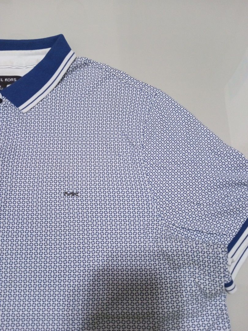Michael kors polo shirt (Category: Activewear) located in Manila. Submitted by _t20hrift (Listing ID 1466331764, Image 3). Description: Michael kors polo shirt Size • Medium As new condition 23 | 27 Dimension.