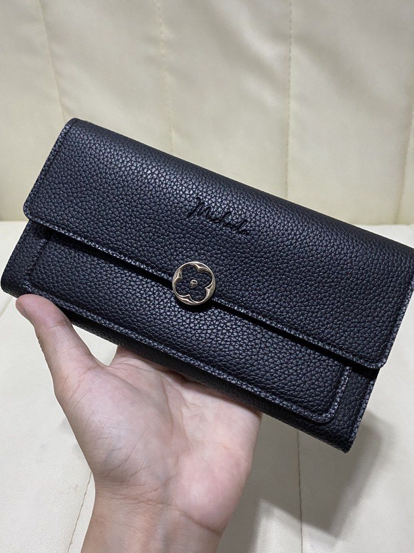 Michaela Black Pebbled Leather Long Wallet (Category: Wallets & Card holders) located in San Mateo. Submitted by sellstuffs_mnl (Listing ID 1466290594, Image 1). Description: - Still in very good condition - No visible flaws / no hard issues.