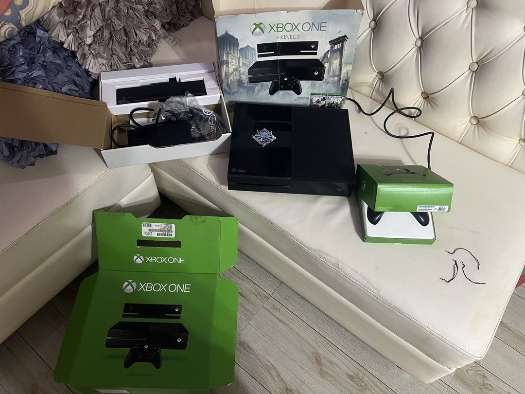 Microsoft Xbox One + Kinect Bundle (Category: Xbox) located in Paranaque City. Submitted by bartheramil (Listing ID 1466312352, Image 3). Description: - Microsoft Xbox One console (Black with custom sticker on top) - Includes Kinect sensor and wireless controller in original packaging - Complete with power brick and all necessary cables - Packed securely inside original boxes - Clean unit, well-maintained and setup-ready - Available for pickup or
