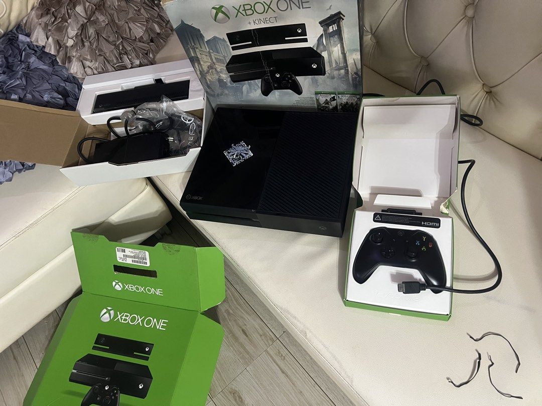 Microsoft Xbox One + Kinect Bundle (Category: Xbox) located in Paranaque City. Submitted by bartheramil (Listing ID 1466312352, Image 2). Description: - Microsoft Xbox One console (Black with custom sticker on top) - Includes Kinect sensor and wireless controller in original packaging - Complete with power brick and all necessary cables - Packed securely inside original boxes - Clean unit, well-maintained and setup-ready - Available for pickup or