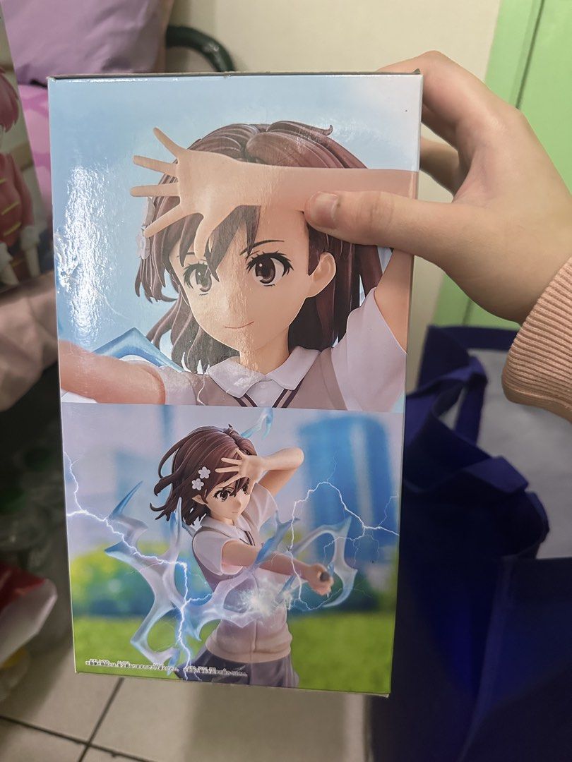 Mikoto Misaka Anime Figure Box (Category: Figurines & Statues) located in Manila. Submitted by silentfire.54ea36 (Listing ID 1466239355, Image 1). Description: - Authentic Mikoto Misaka anime figure packaging box - Features stunning front artwork of her in her school uniform - Depicts her signature lightning-launching abilities - Perfect addition for anime figure collectors looking for original boxes - Note: Original box packaging only (no figure