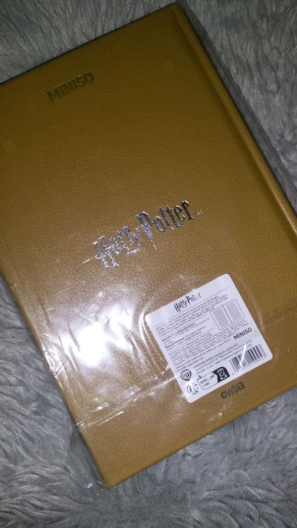 Miniso Harry Potter Hufflepuff A5 Hardcover Notebook (Category: Stationery & School Supplies) located in Paranaque City. Submitted by thriftsbyrei (Listing ID 1466335768, Image 3). Description: PRICE NEGOTIABLE!!! - Item: Miniso Harry Potter Hufflepuff Hardbound journal - Size: A5 - Details: PU embossed hardcover with metallic front crest - Condition: Brand new, still in original plastic packaging - Provenance: Bought from Miniso Parañaque City (