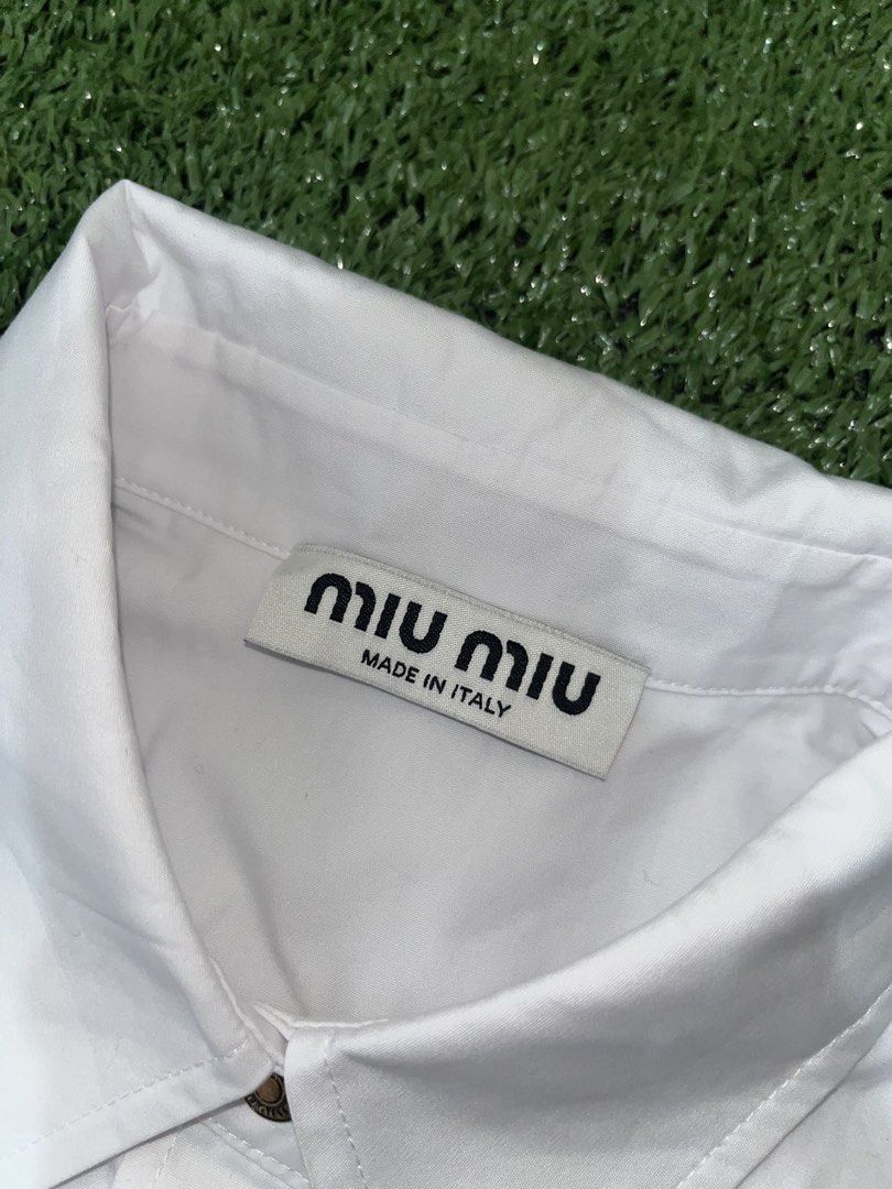 Miu miu (Category: Activewear) located in Manila. Submitted by nevahhbrokeagain (Listing ID 1466252817, Image 2). Description: Miu miu crop top Issue: last pic All details are posted excellent condition 19x16 750 only! 📥📥.