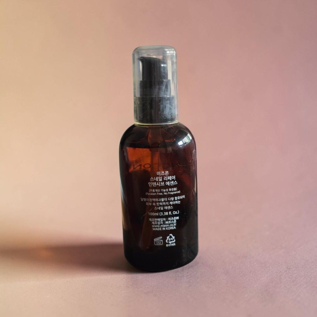 Mizon Multi Function Formula Snail Repair Intensive Essence 100ml (Category: Face Care) located in Taguig. Submitted by altainfante (Listing ID 1466201854, Image 2). Description: - Authentic Mizon Snail Repair Intensive Essence (100ml) - Made in Korea with dual Korean/English back label - Powered by snail mucin filtrate for anti-aging and skin elasticity - Fragrance-free and paraben-free gentle formula - Hygienic pump dispenser in a dark glass bo
