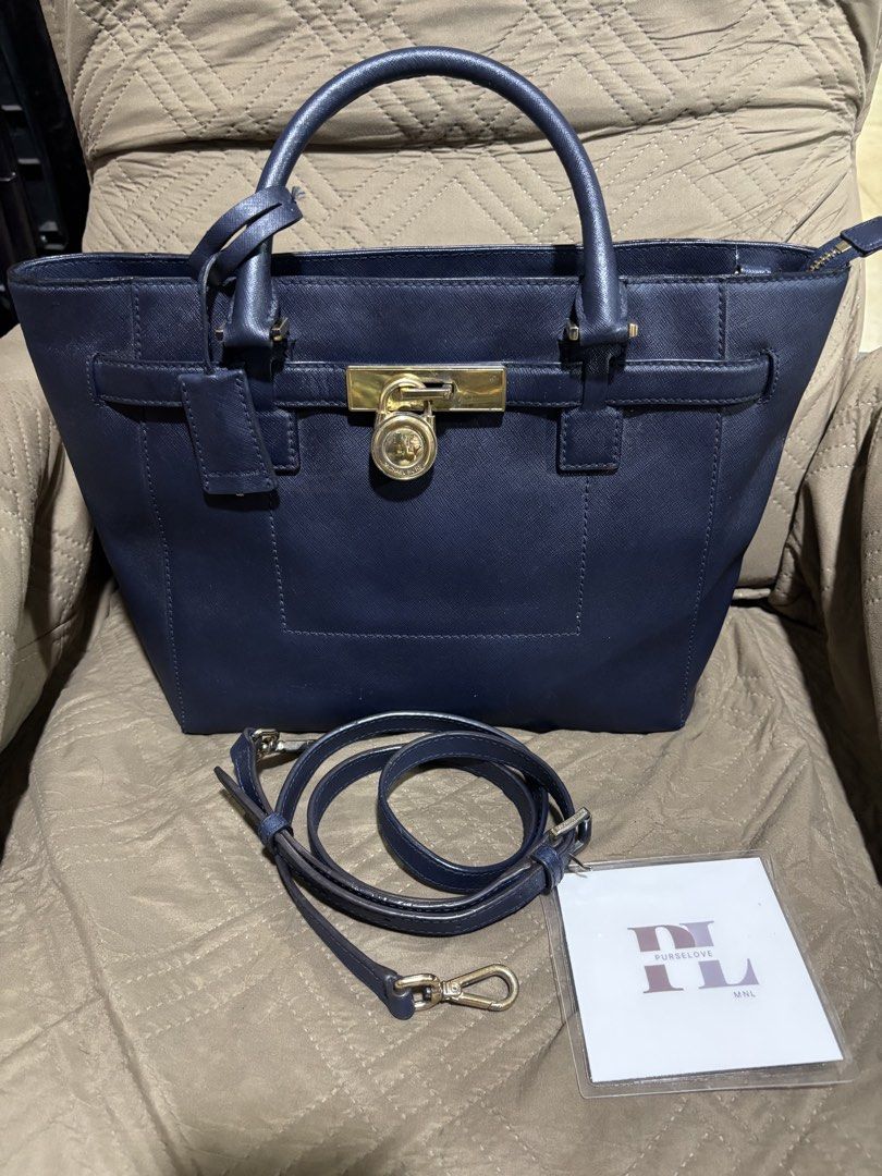 Mk two way bag (Category: Luxury Bags & Wallets) located in Manila. Submitted by purselovemalate (Listing ID 1466286762, Image 1). Description: Minimal signs of use No major flaws.