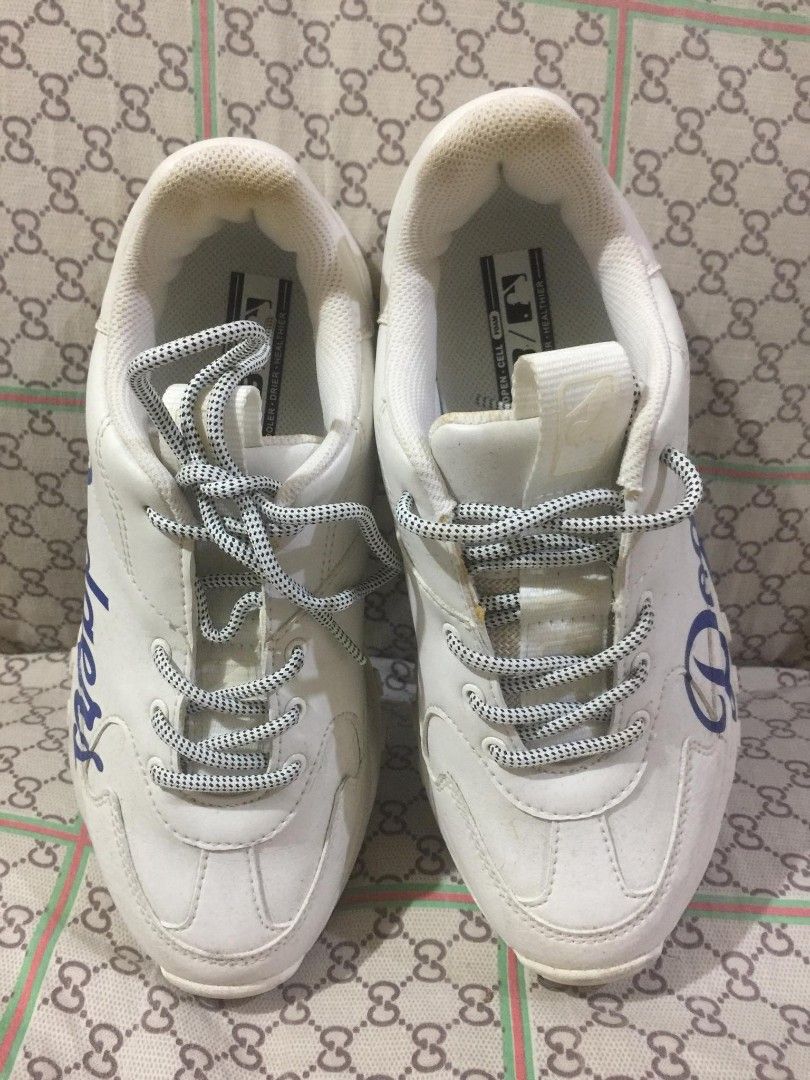 MLB LA Dodgers White Chunky Sneakers Size US 7.5 (Category: Sneakers) located in Del Monte. Submitted by emem25 (Listing ID 1466214325, Image 1). Description: - Brand: MLB Los Angeles Dodgers - Color: White with blue cursive branding - Style: Chunky sneakers with patterned laces - Size: US 7.5 / UK 4.5 / EUR 38.5 / 245mm - Condition: Clean overall, with minor yellowing around the collar area from regular wear.