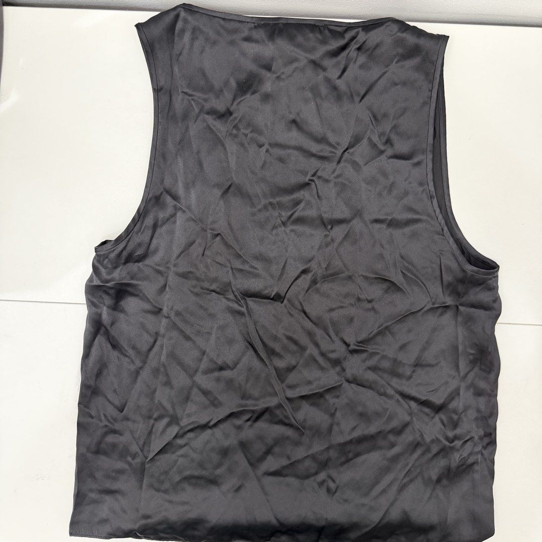 MNG Selection 100% Silk Black Tank Top (Category: Sleeveless) located in Pasig City. Submitted by boymom20 (Listing ID 1466197669, Image 3). Description: - Brand: MNG Selection - Material: 100% pure silk with a smooth finish - Color: Classic black - Details: Scoop neckline, lightweight, regular fit - Condition: Brand new with original retail tags attached, never worn - Style: Versatile piece, easy to dress up or down for day to night looks LAST P