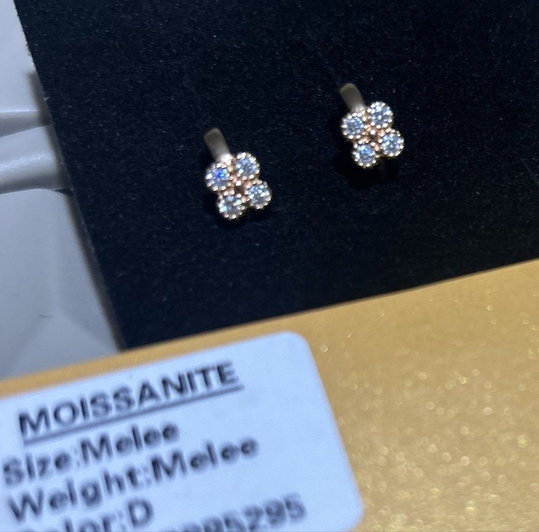 Moissanite Huggies Earrings (Category: Earrings) located in Marikina City. Submitted by decluttering.matters (Listing ID 1462394298, Image 2). Description: Moissanite earrings with clover design - Huggie hoop style - S925 - Silver setting in champagne gold color - Adorned with small moissanite stones - See photos for details FREE: dark red crystal necklace (new) No reservations. Payment first via GCash. First to pay gets the item. Shipping will b