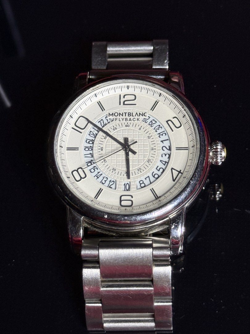 Montblanc Chronometer and Montblanc Flyback Watches (Category: Luxury Watches) located in Quezon City. Submitted by ddozed (Listing ID 1466295183, Image 2). Description: - Authentic Montblanc watch bundle, perfect for collectors - Watch 1: Black dial chronometer with Roman numerals, date window, and steel bracelet - Watch 2: White textured dial with Arabic numerals, flyback chronograph, and steel bracelet - Movement: Automatic for both timepieces