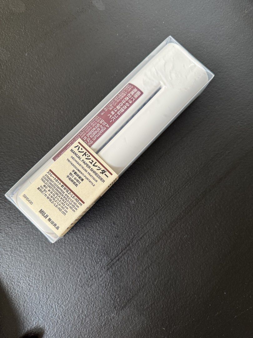 MUJI Manual Paper Shredder (Category: Craft Supplies & Tools) located in Quezon City. Submitted by jrc_98 (Listing ID 1466261285, Image 2). Description: MUJI manual paper shredder in white. Compact size measuring roughly 18.2 by 5 by 3 cm. Handles up to two sheets of paper or one postcard at once. Straight cut style with a 3.5mm width. Lightweight at about 183g. Original clear plastic packaging included..