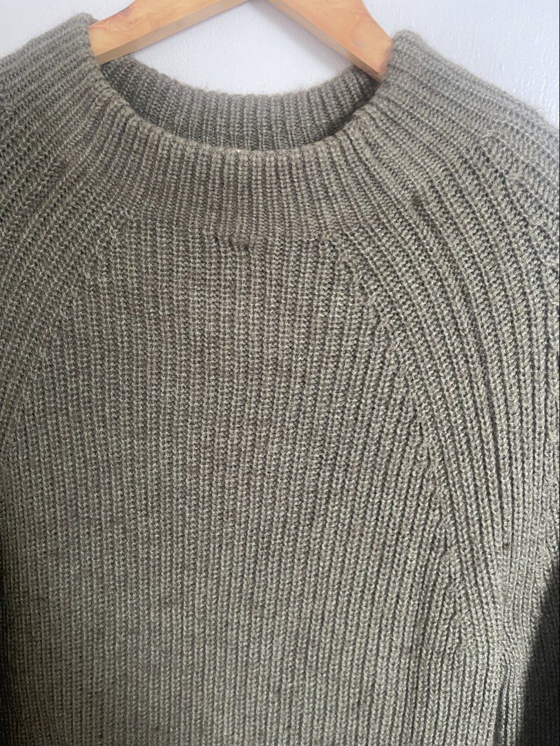 Muji Olive Green Yak Wool Sweater (Category: Longsleeves) located in Quezon City. Submitted by booktt (Listing ID 1466224437, Image 2). Description: with discoloration on shoulder from hanger storage muji yak blend very warm.