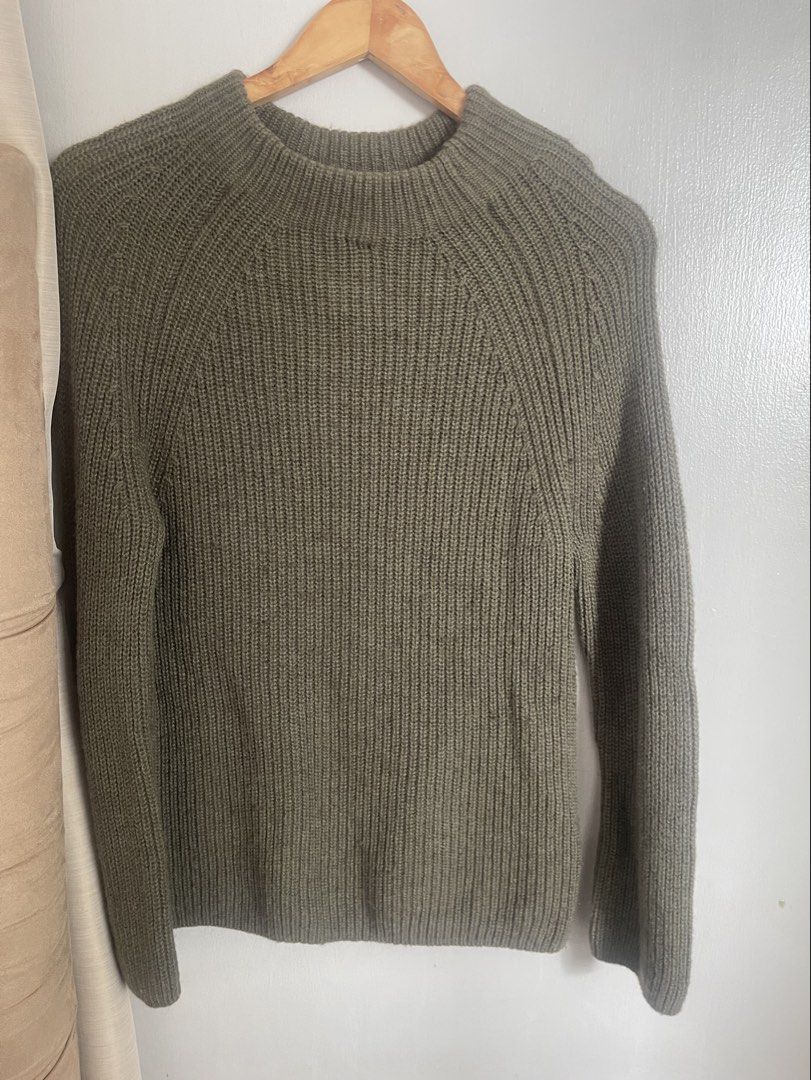 Muji Olive Green Yak Wool Sweater (Category: Longsleeves) located in Quezon City. Submitted by booktt (Listing ID 1466224437, Image 1). Description: with discoloration on shoulder from hanger storage muji yak blend very warm.