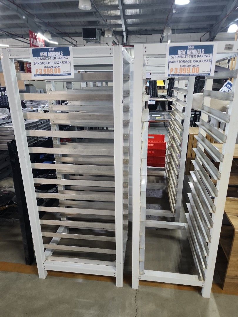 Multi-tier baking pan storage rack 160x60x50cm (Category: Shelves, Cabinets & Racks) located in Cainta. Submitted by christine07. (Listing ID 1466163469, Image 1). Description: - Dimensions: 160 x 60 x 50 cm - Color/Design: Clean white frame with durable metal slots - Build: Heavy-duty, sturdy metal construction for long-lasting use - Capacity: Holds multiple sheet pans and baking trays easily - Ideal For: Commercial kitchens, bakeries, and organ