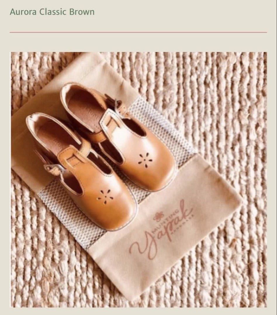 Munting Yapak Aurora Size 14 (Category: Babies & Kids Fashion) located in Manila. Submitted by annediwata (Listing ID 1466214288, Image 2). Description: - Brand: Munting Yapak. Still with Box Orig Price was 2099 - Model: Aurora Classic Brown Leather T-Bar Shoes - Details: Sweet floral cut-out on the toe and adjustable buckle strap - Inclusions: Original branded dust bag - Size: Size 14 please refer to Yapak Size.