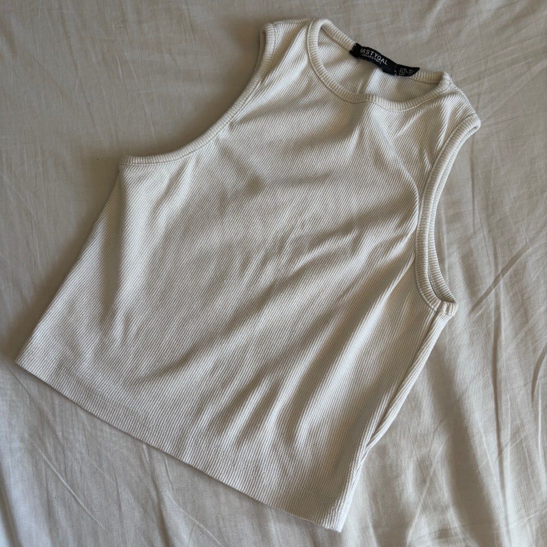 Nastygal Cream Ribbed Racerback Top (Category: Sleeveless) located in Binan City. Submitted by myprelovedhaul (Listing ID 1466249612, Image 1). Description: - fits xs to medium! - no when worn photos! - last price posted! - please message only if sure buyer! - limited replies only. - Available unless mark as sold. - Ship via j&t or lalamove for same day. -Mode of payment: Gcash 📍Biñan Laguna .