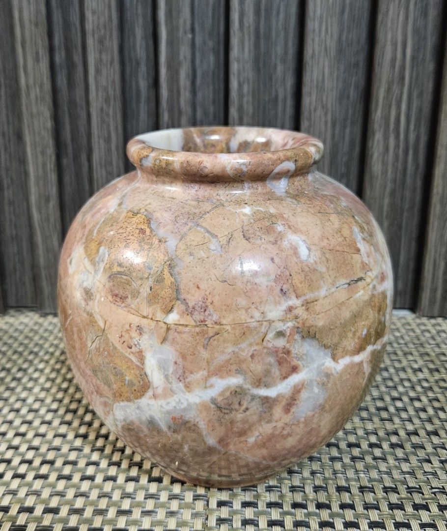 Natural Stone Marble Decorative Vase (Category: Vases & Decorative Bowls) located in Rizal. Submitted by cherry_garcia (Listing ID 1466247918, Image 1). Description: - Material: Natural stone and marble with a polished finish - Design: Unique pink, brown, and white natural veining patterns - Dimensions: Stands approx. 5 inches tall with a small top opening and hollow interior - Build: Heavy, solid, and high-quality construction - Usage: Perfect a