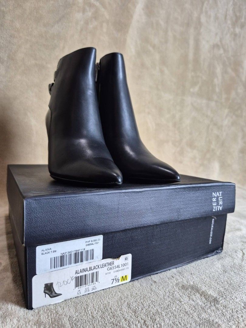 Naturalizer Heeled Ankle Boots (Category: Boots) located in Antipolo. Submitted by mfbien_ownpreloved (Listing ID 1466187882, Image 2). Description: Naturalizer Alaina ankle boots in black leather. Pointed toe design, stiletto heel, and side buckle strap detail. Comes with the original Naturalizer shoe box. Size US 7.5M/ 24.5cm. Purchase price price PHP 9,590. Never used. Outer leather in very good condition. Inner leather with peeling due to sto