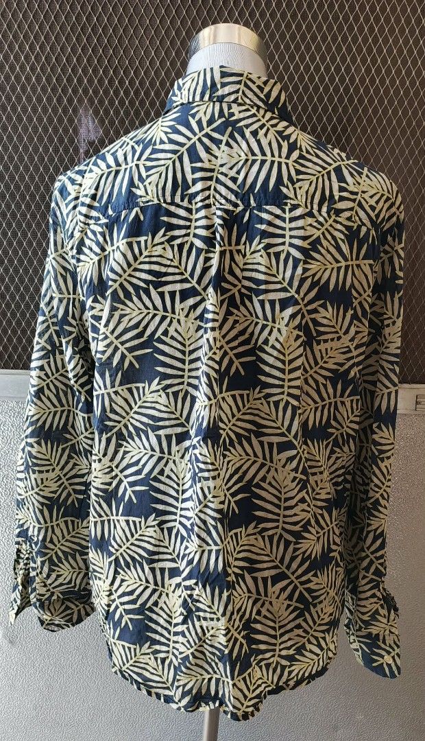 Navy Blue Palm Leaf Print Long Sleeve Button-Down Shirt (Category: Longsleeves) located in Cebu City. Submitted by violacloset (Listing ID 1466225599, Image 2). Description: Measurements: length: 25 width: 22.