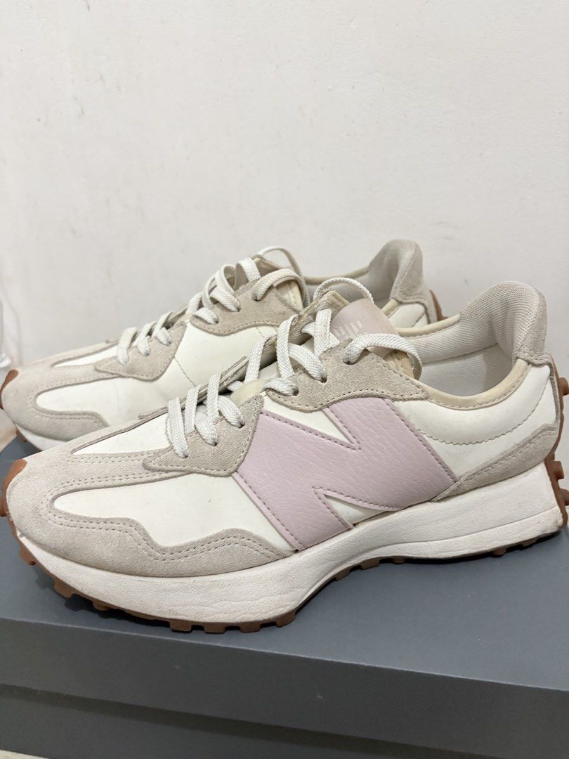 New Balance 327 Moonbean Pink (Category: Sneakers) located in Muntinlupa City. Submitted by closetfinds_ph_952 (Listing ID 1466283631, Image 3). Description: - Model: New Balance 327 - Colorway: Off-white and soft pink with cream suede overlays - Features: Smooth leather base, white laces, branded tongue tag, and signature wrap-around gum lug sole - Inclusion: Original New Balance box - Size is indicated on the box - No issue - Loc: Alabang, Munt