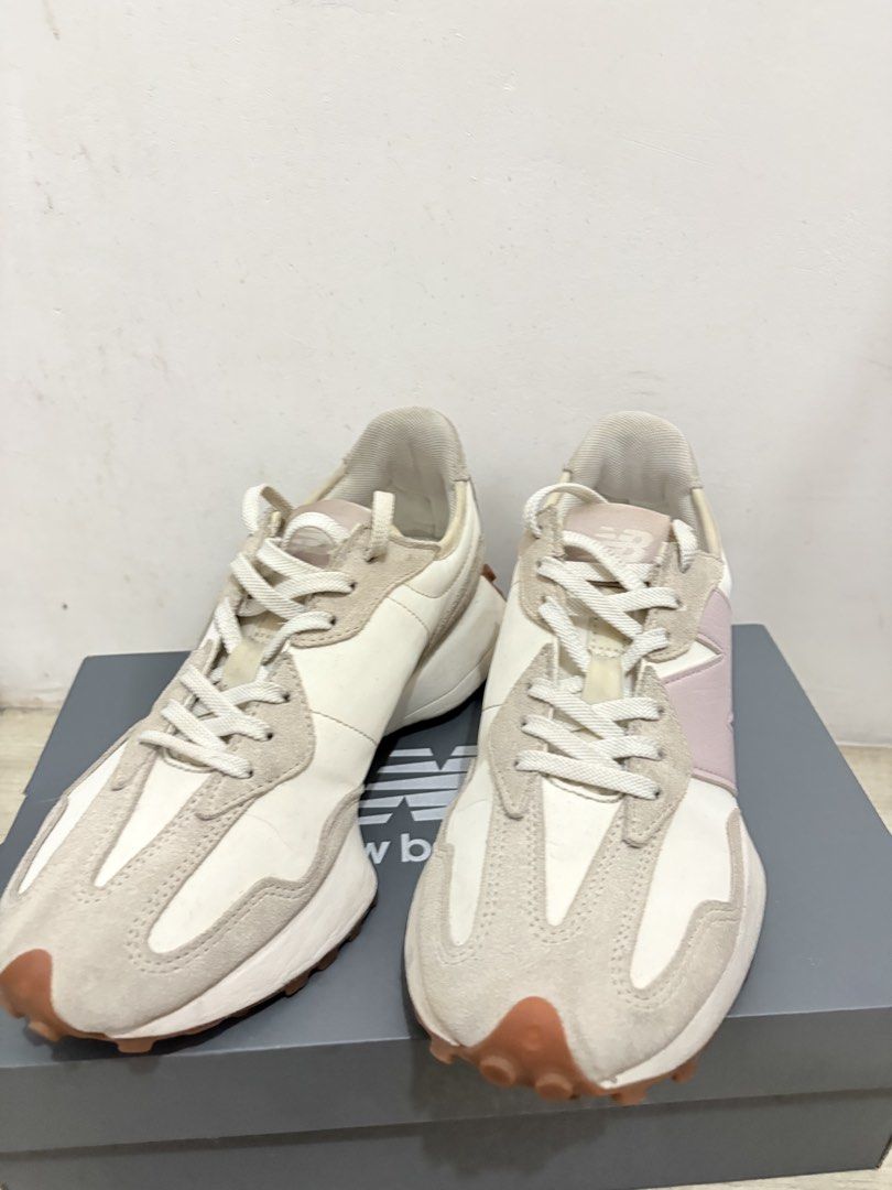 New Balance 327 Moonbean Pink (Category: Sneakers) located in Muntinlupa City. Submitted by closetfinds_ph_952 (Listing ID 1466283631, Image 2). Description: - Model: New Balance 327 - Colorway: Off-white and soft pink with cream suede overlays - Features: Smooth leather base, white laces, branded tongue tag, and signature wrap-around gum lug sole - Inclusion: Original New Balance box - Size is indicated on the box - No issue - Loc: Alabang, Munt