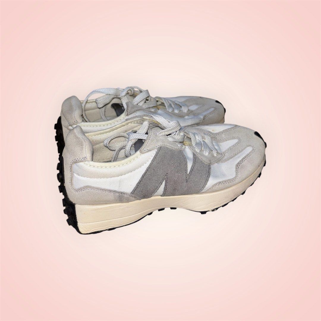 New Balance 327 White Grey Sneakers (Category: Sneakers) located in Rosario. Submitted by preloveditems2002 (Listing ID 1466241593, Image 2). Description: - Model: New Balance 327 Casual Sneakers - Colorway: White and Grey (Versatile neutral palette) - Materials: Nylon upper with premium suede overlays - Design: Signature oversized 'N' logo and chunky EVA midsole with studded rubber outsole wrapping the heel - Condition: Pre-loved with visible si