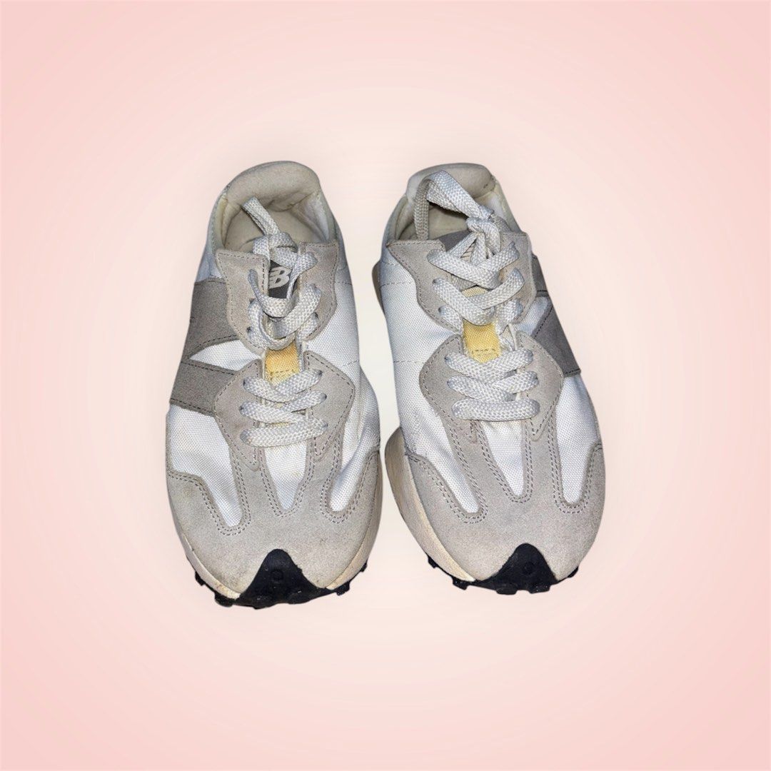 New Balance 327 White Grey Sneakers (Category: Sneakers) located in Rosario. Submitted by preloveditems2002 (Listing ID 1466241593, Image 1). Description: - Model: New Balance 327 Casual Sneakers - Colorway: White and Grey (Versatile neutral palette) - Materials: Nylon upper with premium suede overlays - Design: Signature oversized 'N' logo and chunky EVA midsole with studded rubber outsole wrapping the heel - Condition: Pre-loved with visible si