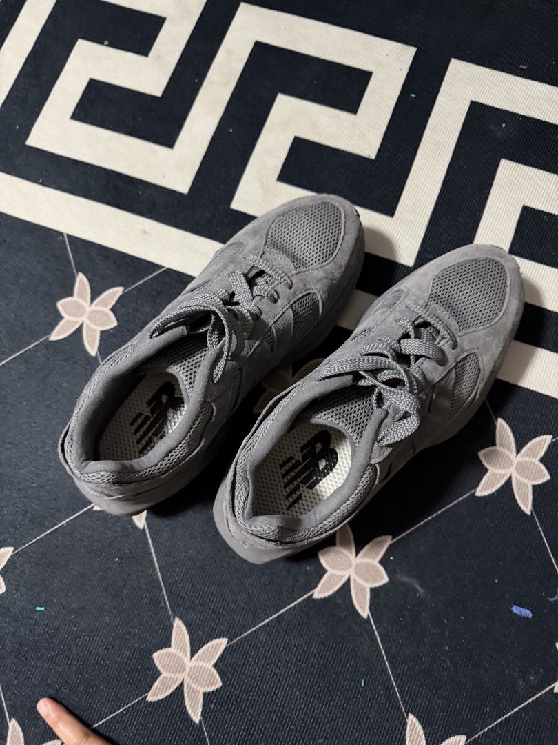 New Balance Grey Running Shoes (Category: Sneakers) located in Muntinlupa City. Submitted by zealdolphin.923128 (Listing ID 1466228533, Image 2). Description: Grey New Balance sneakers with chunky sculpted soles. Mesh and suede panels across the upper. Classic NB logo on the insoles. Textured wavy pattern on the rubber outsoles. Clean uppers and minimal wear on the treads. Great everyday trainers for walking or running..