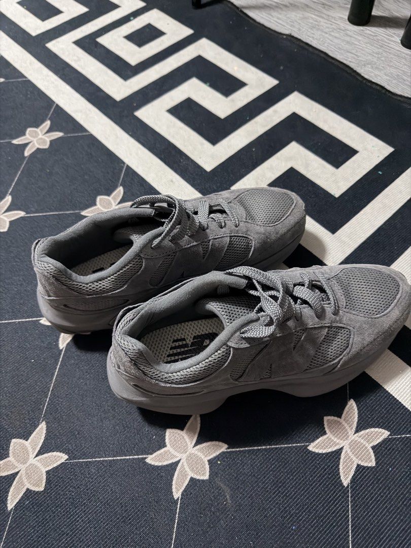 New Balance Grey Running Shoes (Category: Sneakers) located in Muntinlupa City. Submitted by zealdolphin.923128 (Listing ID 1466228533, Image 1). Description: Grey New Balance sneakers with chunky sculpted soles. Mesh and suede panels across the upper. Classic NB logo on the insoles. Textured wavy pattern on the rubber outsoles. Clean uppers and minimal wear on the treads. Great everyday trainers for walking or running..