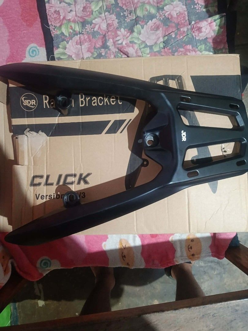 NEW JDR Rear Rack Bracket for Honda Click Version 1/2/3 (Category: Body Parts and Accessories) located in Rizal. Submitted by kairo214 (Listing ID 1466269833, Image 2). Description: - Compatible with Honda Click Version 1, 2, and 3 - Durable matte black finish - Heavy-duty solid metal construction - Includes mounting holes for easy setup - Box included and ready for installation.