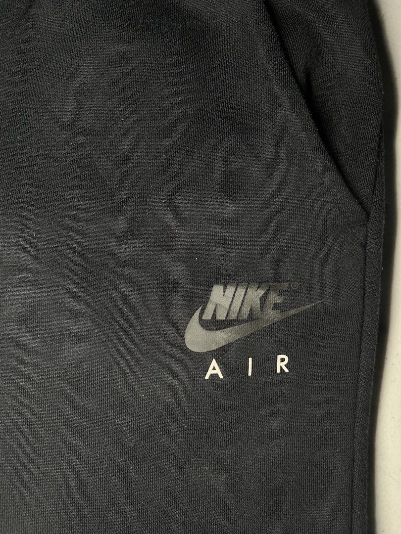 Nike Air Black Sweatpants Straight (Category: Joggers) located in Pasay City. Submitted by Oboyyy (Listing ID 1466192692, Image 3). Description: - Brand: Nike Air - Color: Black - Size: Large (L) - Fit: Comfortable, perfect for daily wear or lounging - Features: Elastic waistband with drawstring, convenient side pockets, and cuffed ankles - Branding: Nike Air logo printed on the left leg - Condition: Clean fabric, standard tags intact inside - Or