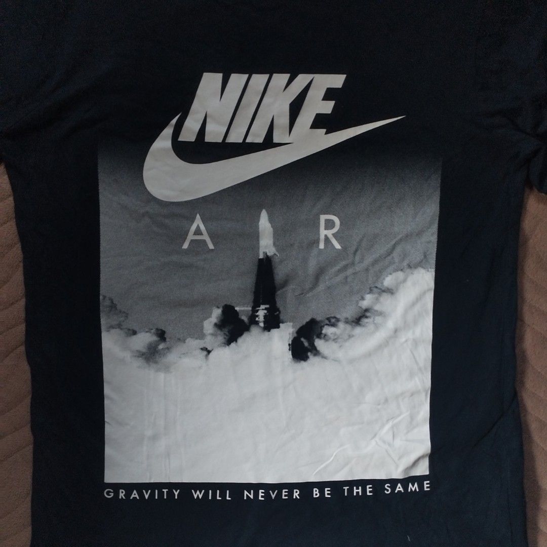 Nike Air "Gravity Will Never Be The Same" Rocket Graphic Tee (Category: Tshirts & Polo Shirts ) located in Davao. Submitted by giyuu06 (Listing ID 1466256257, Image 3). Description: Nike Air "Gravity Will Never Be The Same" Rocket Graphic Tee | MEDIUM | Excellent Condition L 27 W 19.