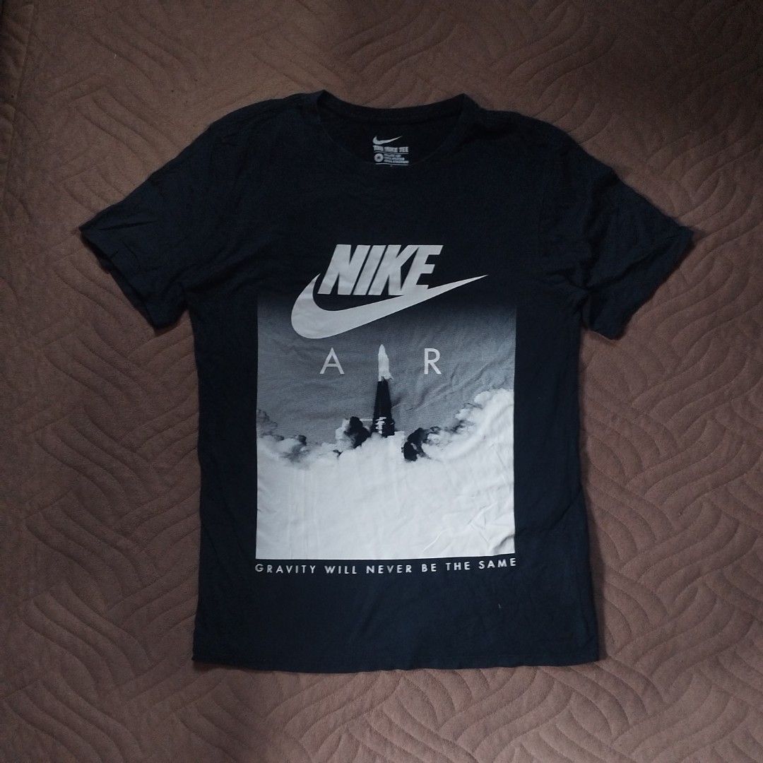 Nike Air "Gravity Will Never Be The Same" Rocket Graphic Tee (Category: Tshirts & Polo Shirts ) located in Davao. Submitted by giyuu06 (Listing ID 1466256257, Image 1). Description: Nike Air "Gravity Will Never Be The Same" Rocket Graphic Tee | MEDIUM | Excellent Condition L 27 W 19.