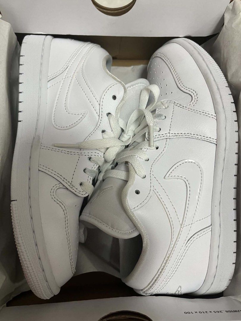 Nike Air Jordan 1 Low Triple White (Category: Sneakers) located in Santa Rosa. Submitted by totgaaaaa (Listing ID 1466287649, Image 1). Description: - 100% Authentic clean white Air Jordan 1 Low sneakers - Premium leather upper with matching laces and tonal stitching - Iconic embroidered Jumpman logo on the tongue - Classic Wings logo on the heel - Includes original white shoebox - Versatile everyday kicks that match any fit - Condition: Like new