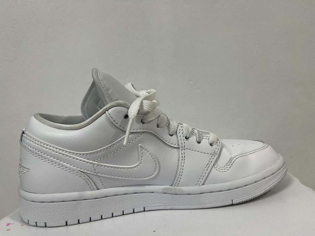 Nike Air Jordan 1 Low Triple White (Category: Sneakers) located in Santa Rosa. Submitted by totgaaaaa (Listing ID 1466287649, Image 2). Description: - 100% Authentic clean white Air Jordan 1 Low sneakers - Premium leather upper with matching laces and tonal stitching - Iconic embroidered Jumpman logo on the tongue - Classic Wings logo on the heel - Includes original white shoebox - Versatile everyday kicks that match any fit - Condition: Like new
