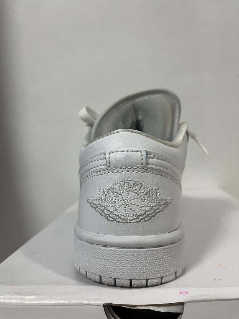 Nike Air Jordan 1 Low Triple White (Category: Sneakers) located in Santa Rosa. Submitted by totgaaaaa (Listing ID 1466287649, Image 3). Description: - 100% Authentic clean white Air Jordan 1 Low sneakers - Premium leather upper with matching laces and tonal stitching - Iconic embroidered Jumpman logo on the tongue - Classic Wings logo on the heel - Includes original white shoebox - Versatile everyday kicks that match any fit - Condition: Like new