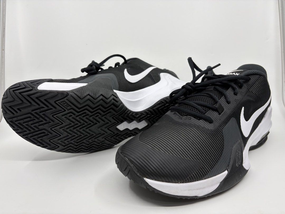 Nike Air Max Impact 4 Black White Size 12 (Category: Sneakers) located in Manila. Submitted by rob.fesalbon (Listing ID 1466250537, Image 2). Description: - Model: Nike Air Max Impact 4 basketball shoes - Colorway: Sleek black and white with a striped upper pattern - Size: US Men's 12 (verified on original box tag) - Cushioning: Visible Air unit in the heel for impact protection - Outsole: Durable rubber with a high-traction pattern for court gri