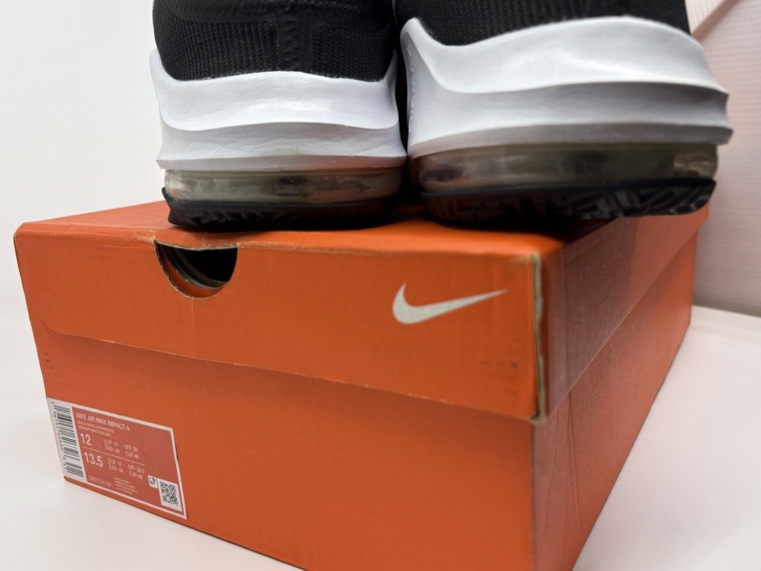 Nike Air Max Impact 4 Black White Size 12 (Category: Sneakers) located in Manila. Submitted by rob.fesalbon (Listing ID 1466250537, Image 3). Description: - Model: Nike Air Max Impact 4 basketball shoes - Colorway: Sleek black and white with a striped upper pattern - Size: US Men's 12 (verified on original box tag) - Cushioning: Visible Air unit in the heel for impact protection - Outsole: Durable rubber with a high-traction pattern for court gri