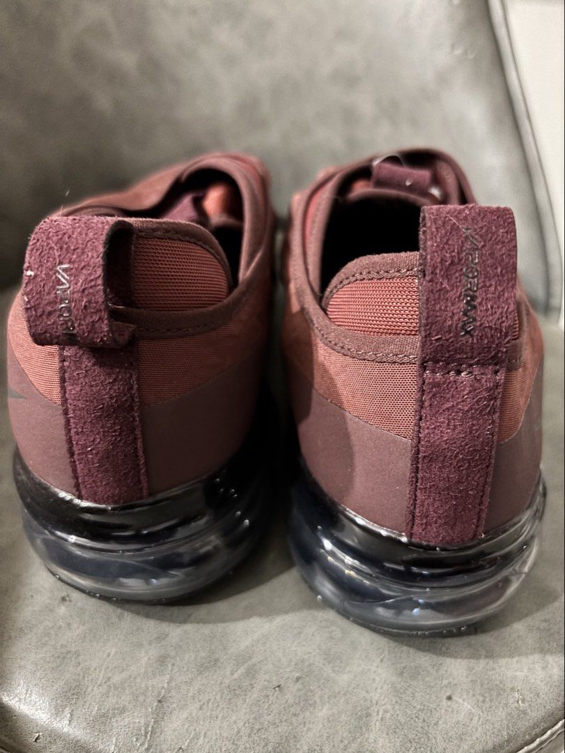Nike Air Vapormax Moc Roam (Category: Sneakers) located in Muntinlupa City. Submitted by carlosteady (Listing ID 1466205795, Image 3). Description: - Nike Air Vapormax Moc Roam DZ7273 - Colorway: Dragon red and black - Design: Laceless slip-on style with branded suede heel pull tabs - brand new no box Size 9.5 mens Issue: see last photo, pen markings Retails for 9k to 11k online.
