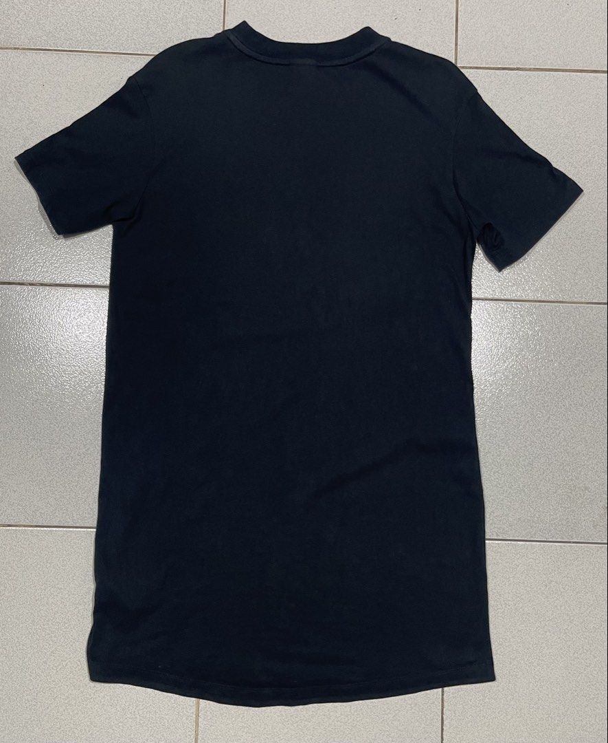Nike Black Dress (Category: Dresses) located in Mandaue City. Submitted by MJ_80 (Listing ID 1466272580, Image 2). Description: Nike Black Sportswear Dress Tshirt Small Dimes: 18 X 33 See photos for measurements Color rate & Condition: 9.8/10 Price: 450.
