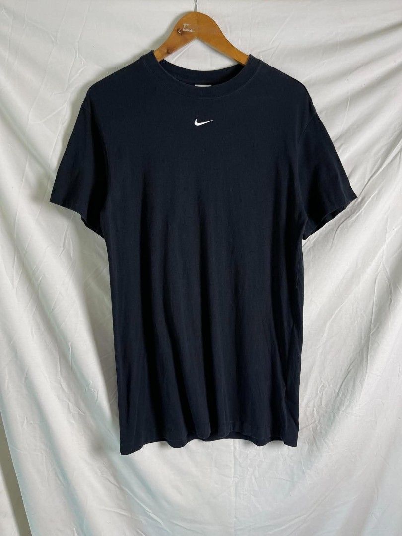 Nike Centre Swoosh Black T-Shirt (Category: Tshirts & Polo Shirts ) located in Manila. Submitted by japee55 (Listing ID 1466322151, Image 1). Description: - Brand: Nike - Color: Solid black with embroidered white center swoosh - Size: Medium (Regular fit) - Material: 100% soft and comfortable cotton - Condition: Excellent basic tee, perfect for daily wear - Origin: Made in China.