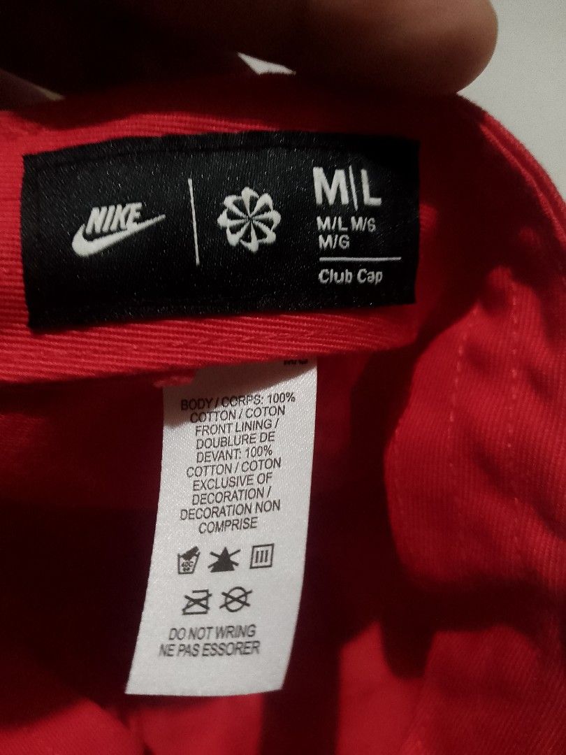 Nike Club Cap Red from US (Category: Caps & Hats) located in Manila. Submitted by martinezvp25582 (Listing ID 1466268519, Image 2). Description: - Brand: Nike - Color: Bright Red - Style: Classic curved brim with white embroidered logo - Material: 100% cotton body and lining - Size: M/L - Closure: Adjustable back strap with metal buckle - Condition: Clean fabric inside and out.