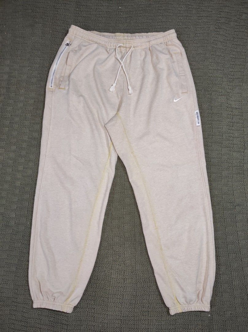 NIKE DRI-FIT EMBROID SWOOSH PANTS (Category: Joggers) located in Las Pinas. Submitted by jeusmanlangit (Listing ID 1466252846, Image 2). Description: NIKE DRI-FIT EMBROID SWOOSH PANTS SIZE: XL ON TAG DIMES: W: 34-38 L: 39 ISSUE: STAIN SA LIKOD NG ISANG HITA NEED LANG IBABAD 550 PESOS LANG DM📩.