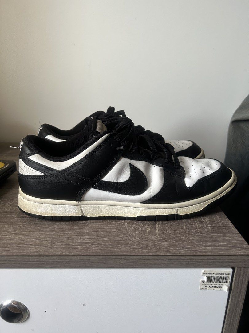 Nike Dunk Low Retro White Black Panda (Category: Sneakers) located in Calamba. Submitted by lancedrew888317 (Listing ID 1466228293, Image 3). Description: - Item: Nike Dunk Low Retro (Black & White) - Size: US 11 / EUR 45 - Material: Premium leather upper with breathable perforated toe box - Condition: Pre-loved with some dirt and wear on the soles, still a solid everyday rotation pair - Style: Iconic monochromatic streetwear sneaker that matches