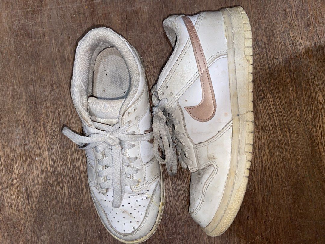 nike dunk white and rose gold (Category: Sneakers) located in Agoo. Submitted by strobeiry (Listing ID 1466298475, Image 2). Description: nego! need cleaning lang. medyo open na rin yung gilid pero i think shoe glue lang need rfs: declutterring .