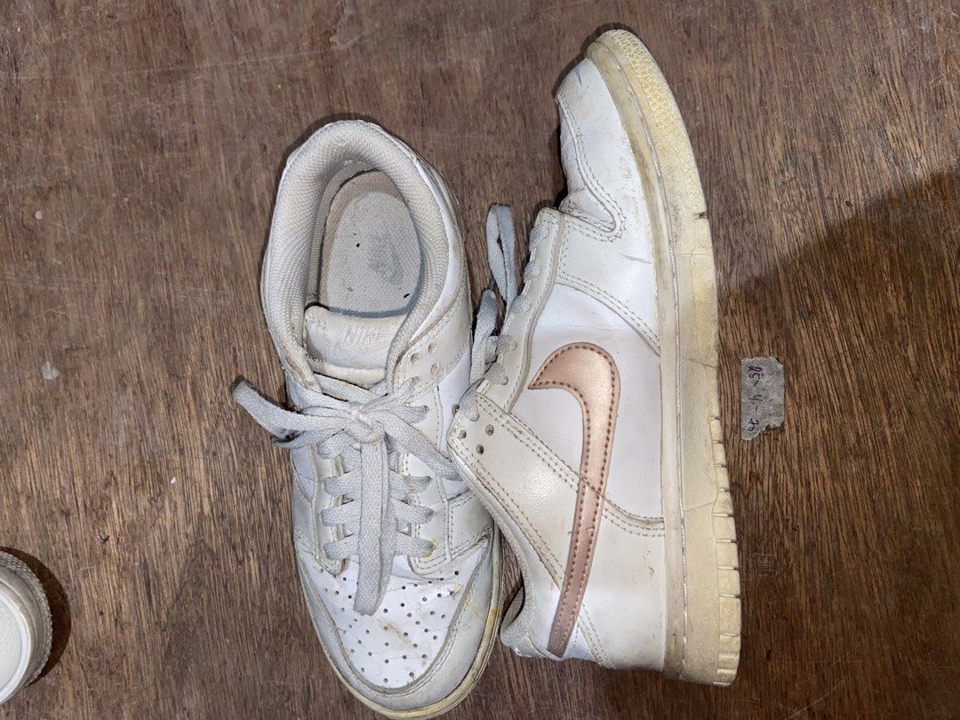 nike dunk white and rose gold (Category: Sneakers) located in Agoo. Submitted by strobeiry (Listing ID 1466298475, Image 3). Description: nego! need cleaning lang. medyo open na rin yung gilid pero i think shoe glue lang need rfs: declutterring .